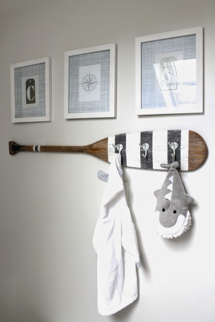  Add Hooks to an Old Paddle for a Towel Rack