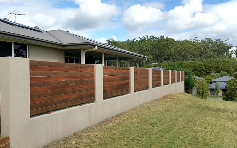 Wooden Planks Among Concrete